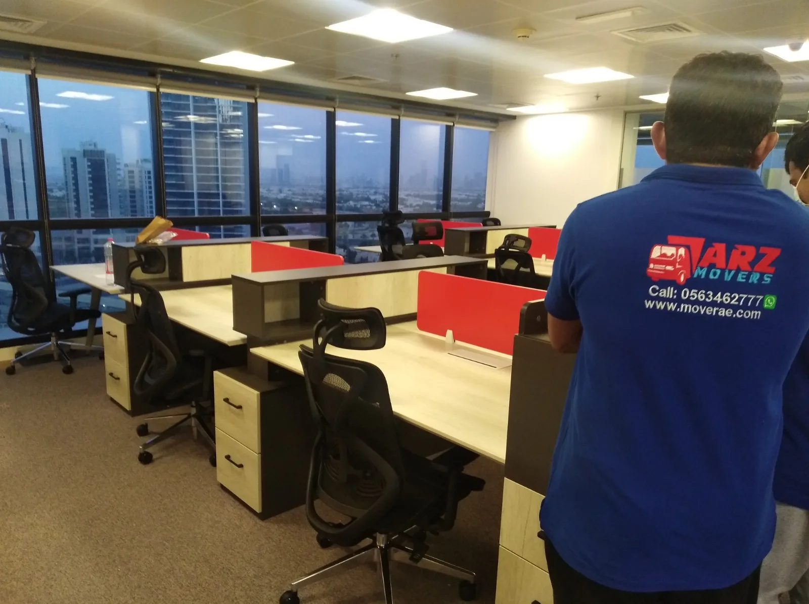 ARZ Movers crew completing an office fit-out in a Dubai tower